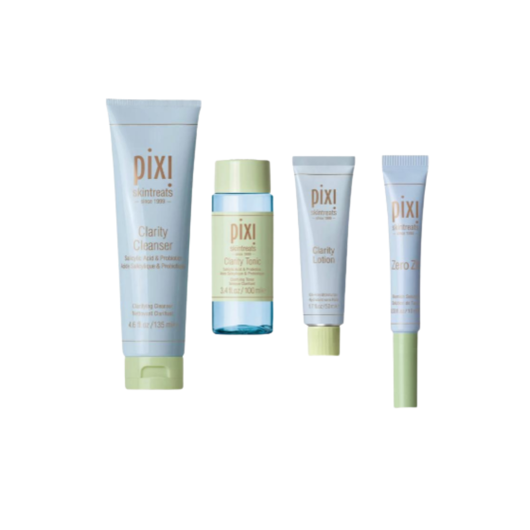 Pixi Clarity skincare set with cleanser tube, toner bottle, lotion tube, and spot treatment tube