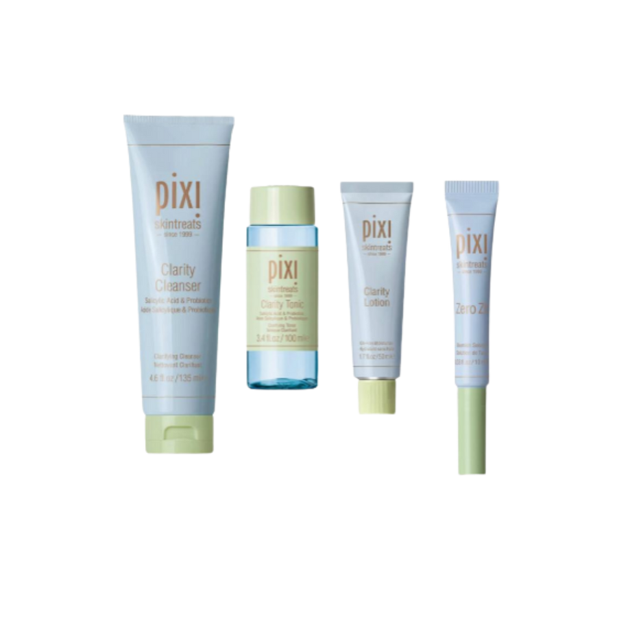 Pixi Clarity skincare set with cleanser tube, toner bottle, lotion tube, and spot treatment tube