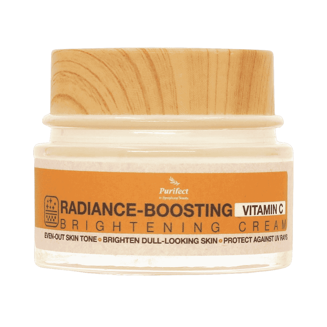 Purifect Radiance Boosting Vitamin C brightening cream jar with wooden lid and orange product label
