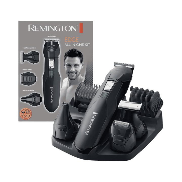 Remington all-in-one grooming kit with wide trimmer, shaver attachments, combs, and travel pouch.