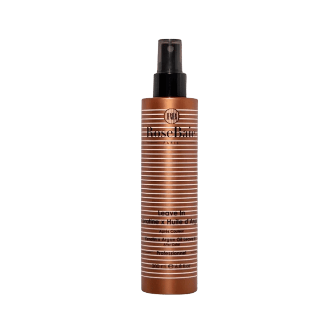 RoseBaie Paris keratin and argan oil leave-in spray, 200 ml, in bronze bottle with black pump cap.