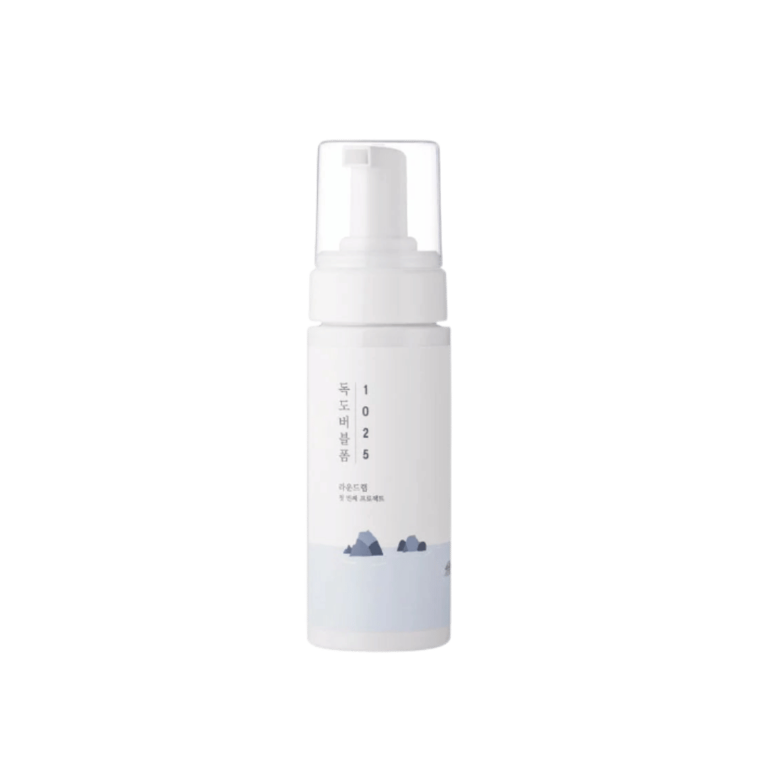 White Korean 1025 foaming cleanser pump bottle with clear cap and pale blue label