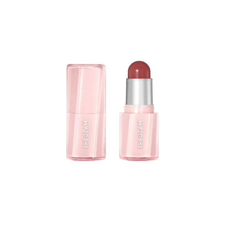SHEGLAM cream blush stick in muted rose shade, pink rectangular tube with matching translucent cap.