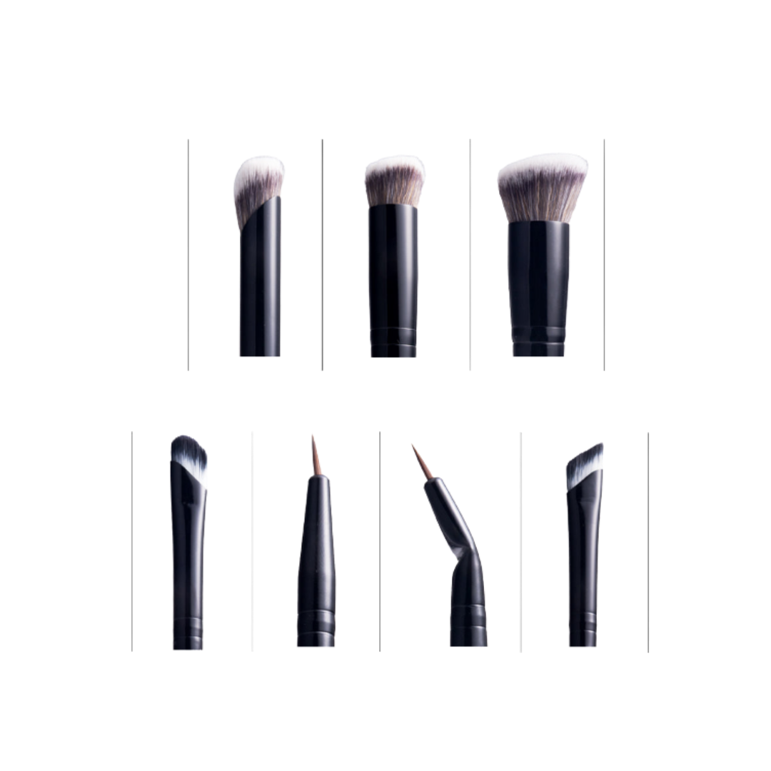 Makeup brush set with black handles and multiple angled, flat, and rounded brush heads