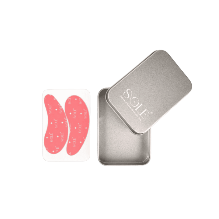 Solf under-eye patches with silver storage tin and pink crescent-shaped gel pads