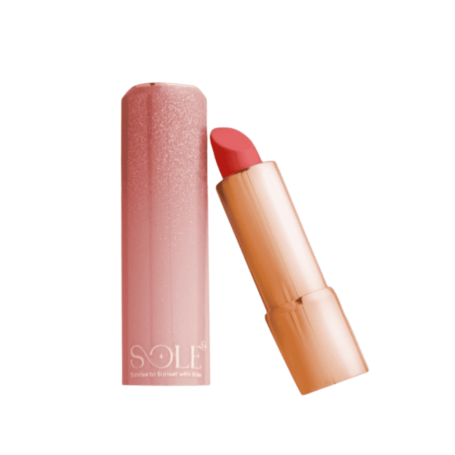 Sole lipstick coral shade with glitter pink case and gold bullet tube