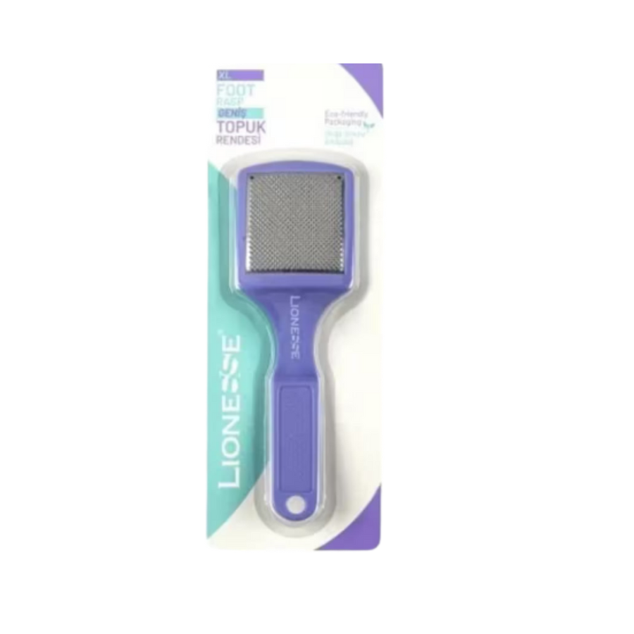 The image shows a foot rasp from the brand Lionesse. It is designed to remove calluses and rough skin from the feet. The packaging indicates that it is "Eco-Friendly Packaging," and the product is labeled as "Foot Rasp" (Topuk Rendesı in Turkish). The tool has a purple handle and a textured metal head for exfoliating. The packaging also mentions that it is an "XL" size.