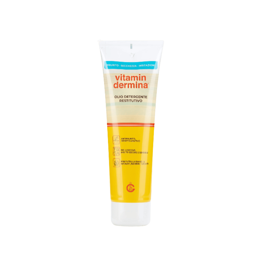 Vitamin Dermina restorative cleansing oil in clear squeeze tube with yellow liquid and white cap.
