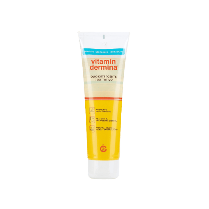 Vitamin Dermina restorative cleansing oil in clear squeeze tube with yellow liquid and white cap.