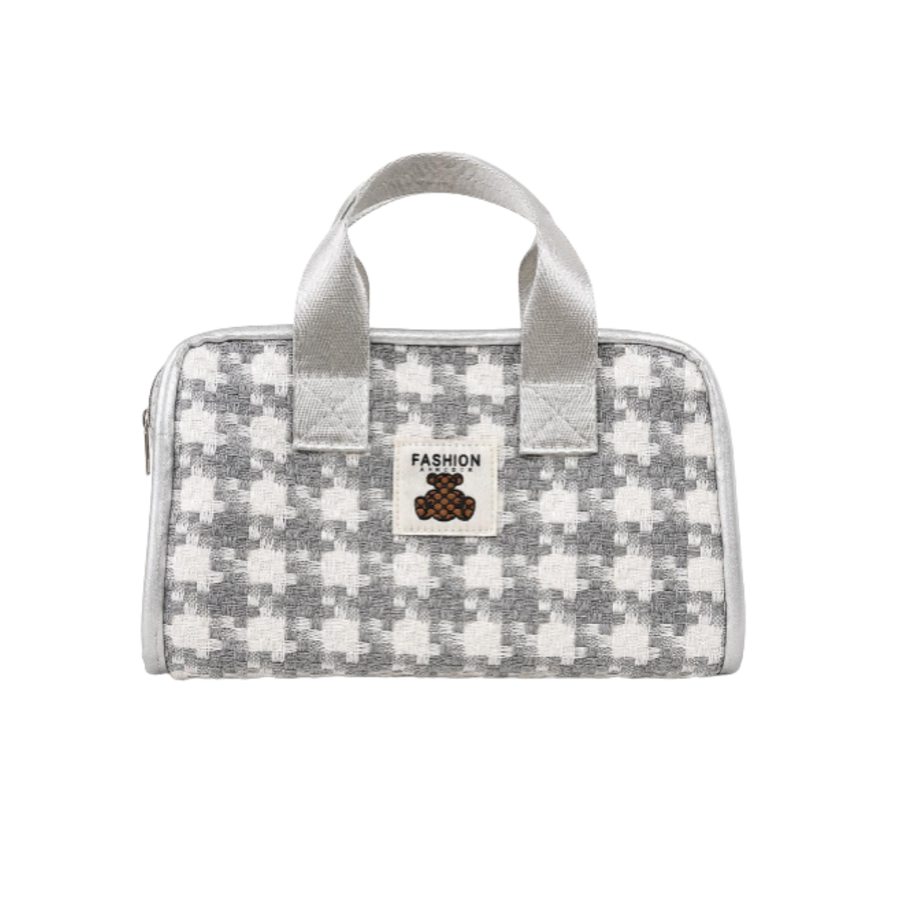 Gray and white patterned cosmetic bag with two handles, zipper closure, and small Fashion patch.