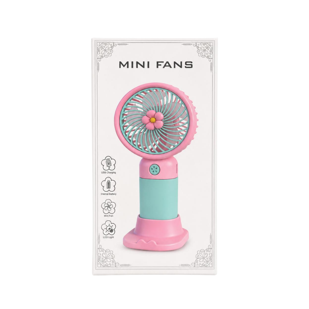 Wonder Fan Mini Fans pink and mint handheld fan with flower grille on white box