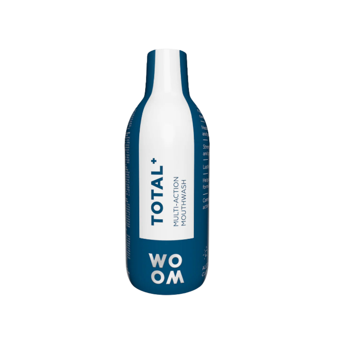 WOOM Total+ multi action mouthwash bottle, blue and white packaging, oral care liquid product.
