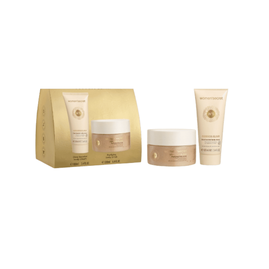 Women'secret body care gift set with Glow Booster cream, Purifying scrub and Elixir serum in gold packaging.