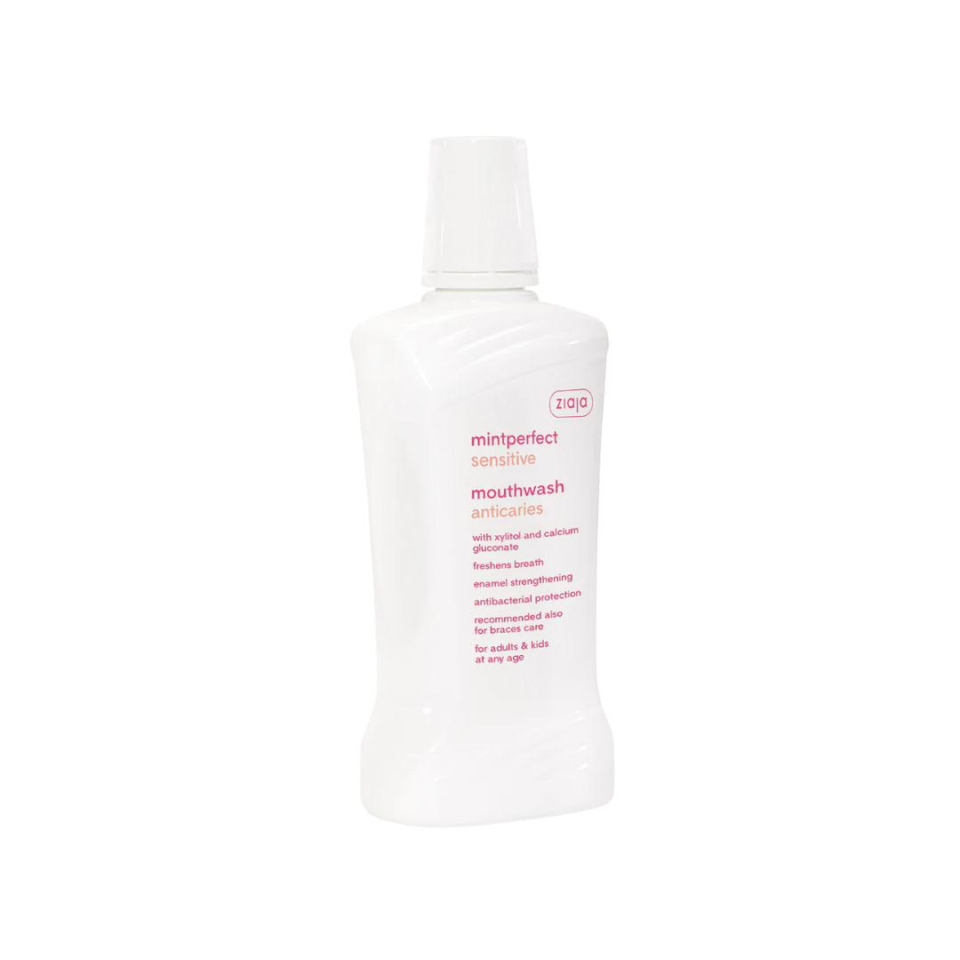 Ziaja Mintperfect Sensitive mouthwash anticaries, white plastic bottle, mint flavor, flip cap, oral care labeling.