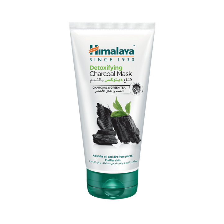 Himalaya Detoxifying Charcoal Mask charcoal and green tea white tube with green flip-top cap
