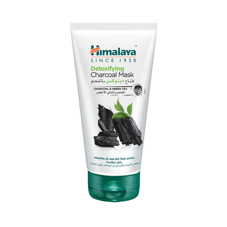 Himalaya Detoxifying Charcoal Mask charcoal and green tea white tube with green flip-top cap
