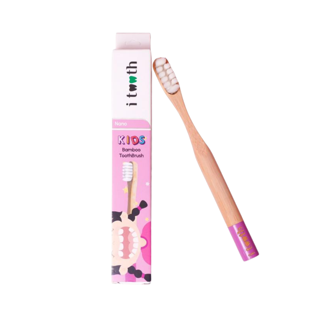 i tooth Kids Nano Bamboo Toothbrush pink handle with white bristles displayed beside matching children’s toothbrush packaging