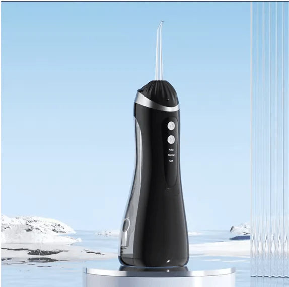PORTABLE ORAL IRRIGATOR | جهاز تنظيف الأسنان بالماء المحمول