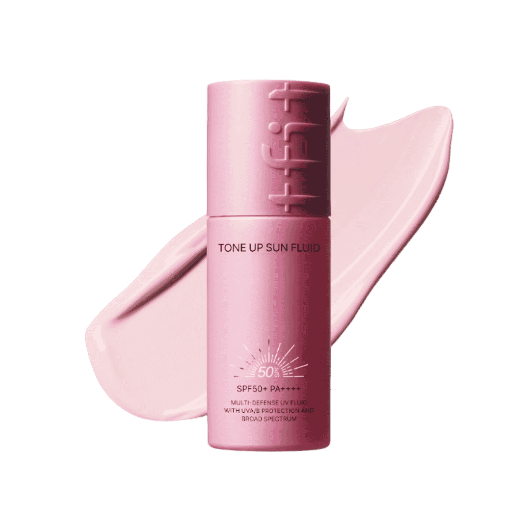 Tfit Tone Up Sun Fluid, pink cylindrical bottle with screw cap, SPF50+ PA++++, printed text branding, swatch of product behind, 583x602px 