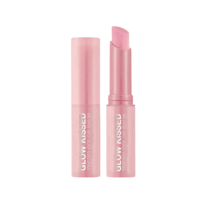 Glow Kissed tinted color balm in pink tube with matching cap and soft pink stick