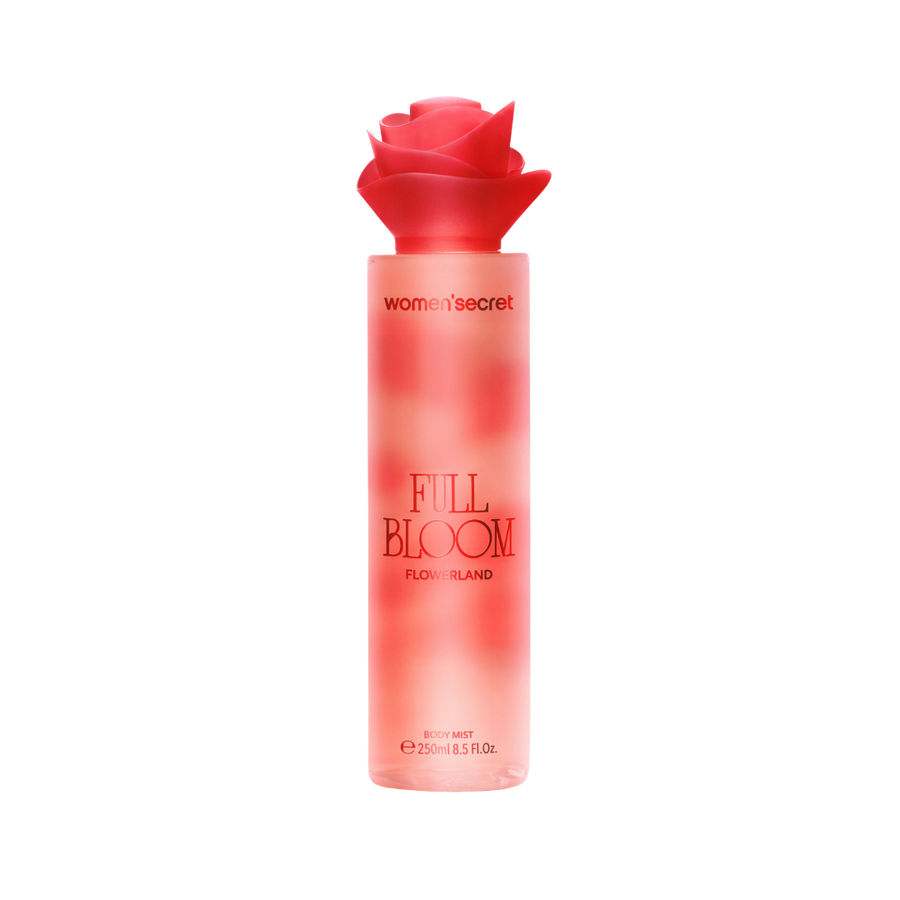 Women’secret Full Bloom Flowerland body mist, 250 ml, in coral-pink frosted bottle with red rose-shaped cap.
