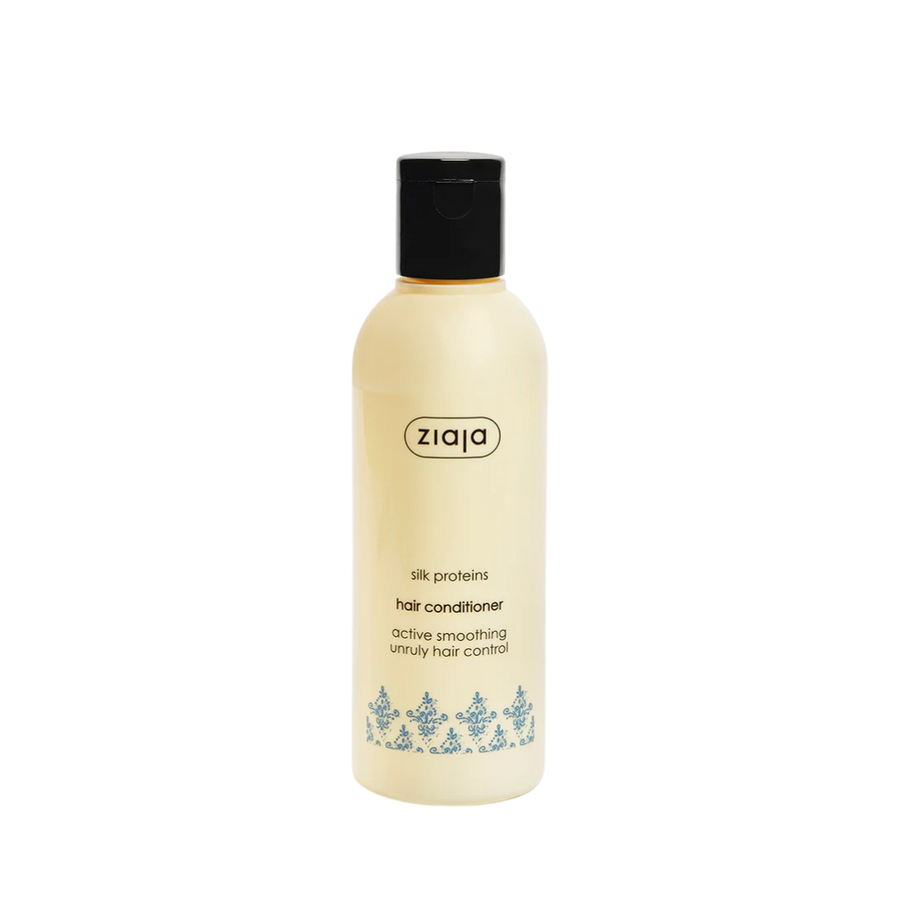 Ziaja Silk Proteins hair conditioner, beige plastic bottle with black cap, smoothing formula labeling visible.